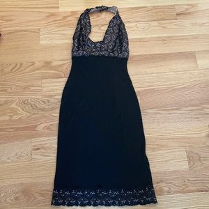 Black dress with lace details.